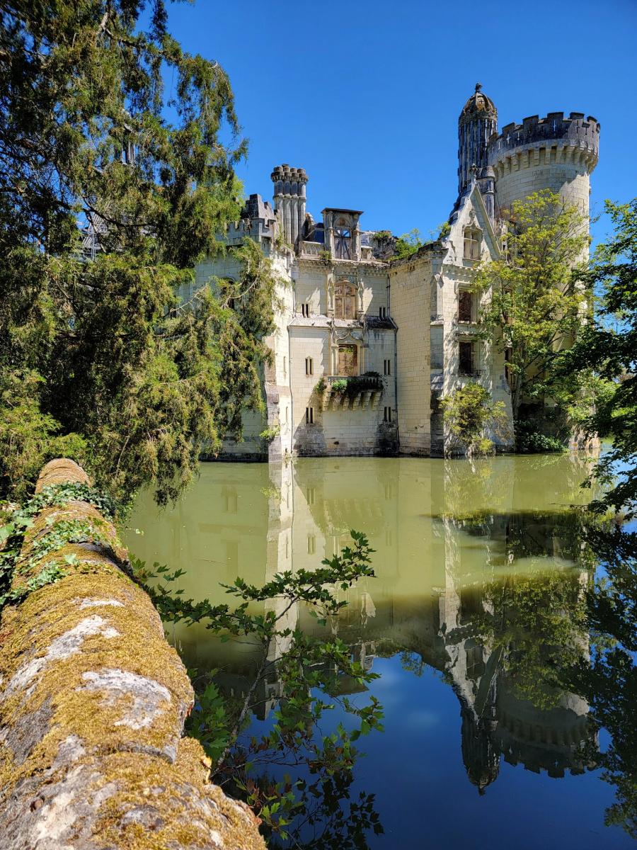 More than 7,400 complete strangers from across the world have clubbed together to buy a historic French chateau to save it from ruin or being razed to the ground by developers.In what organisers say is the first project of its kind in in the world, a crowdfunding appeal raised more than €500,000 in just 40 days to purchase the 13th-century Chateau de la Mothe-Chandeniers in the west of the country.