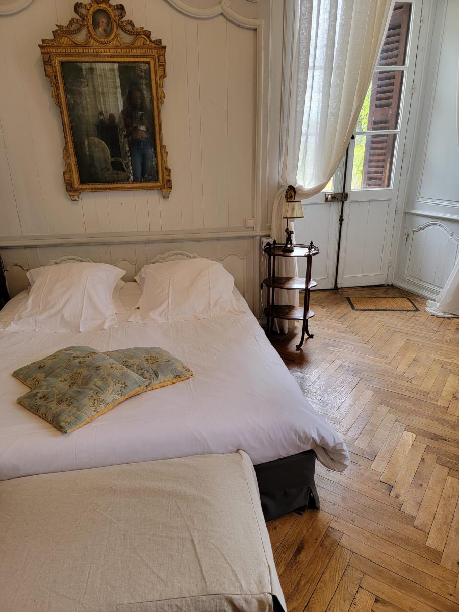 Each room has period furniture, wooden floors and an original fireplace.